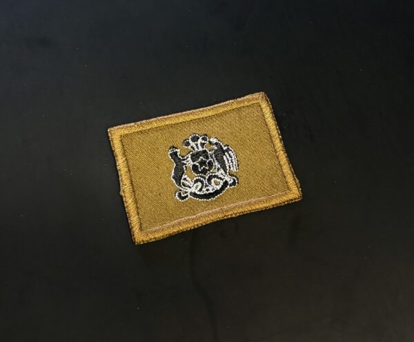 Escudo de quepi Bordado